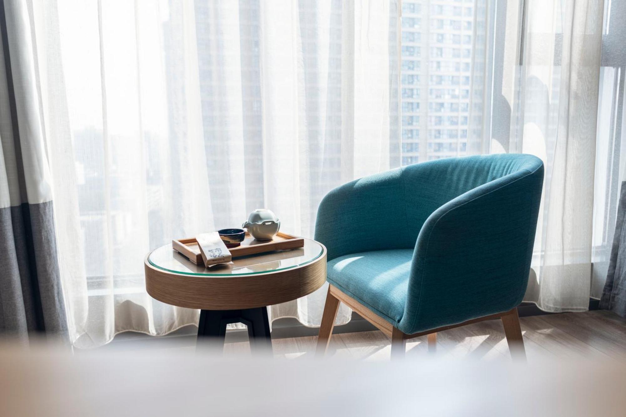 M Hotel Женгжо Екстериор снимка