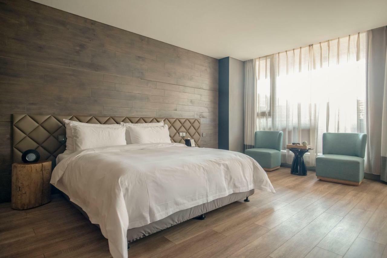 M Hotel Женгжо Екстериор снимка