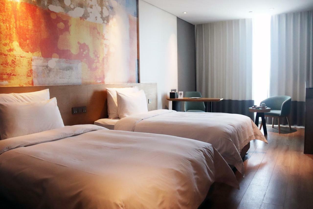 M Hotel Женгжо Екстериор снимка